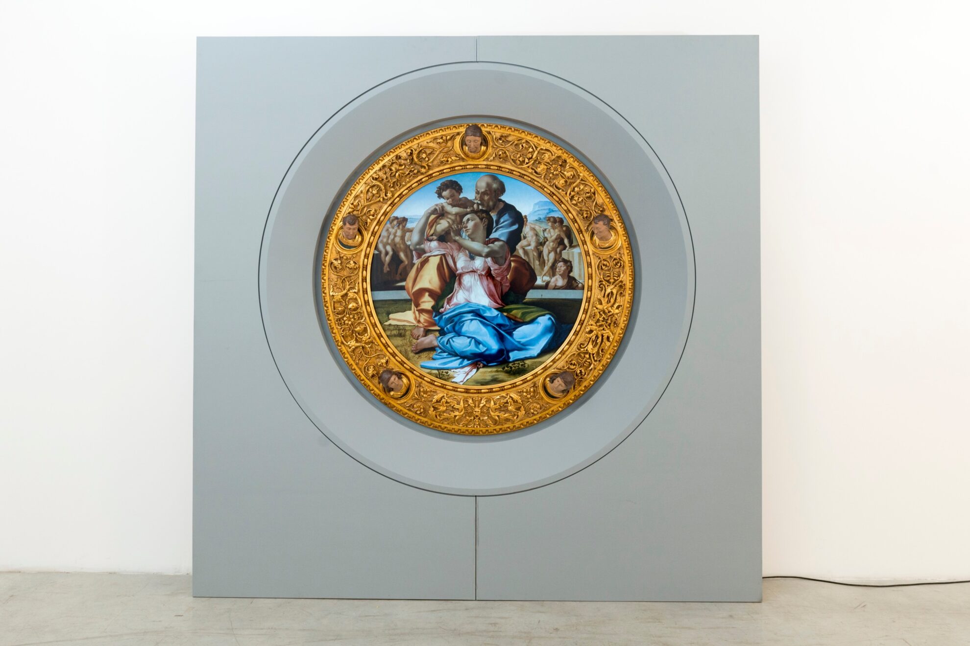 round Renaissance painting in gold frame